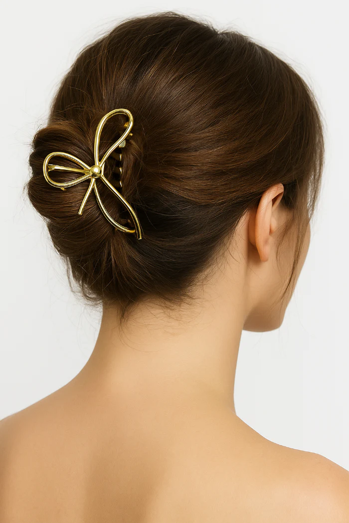 Haarclip strik goud